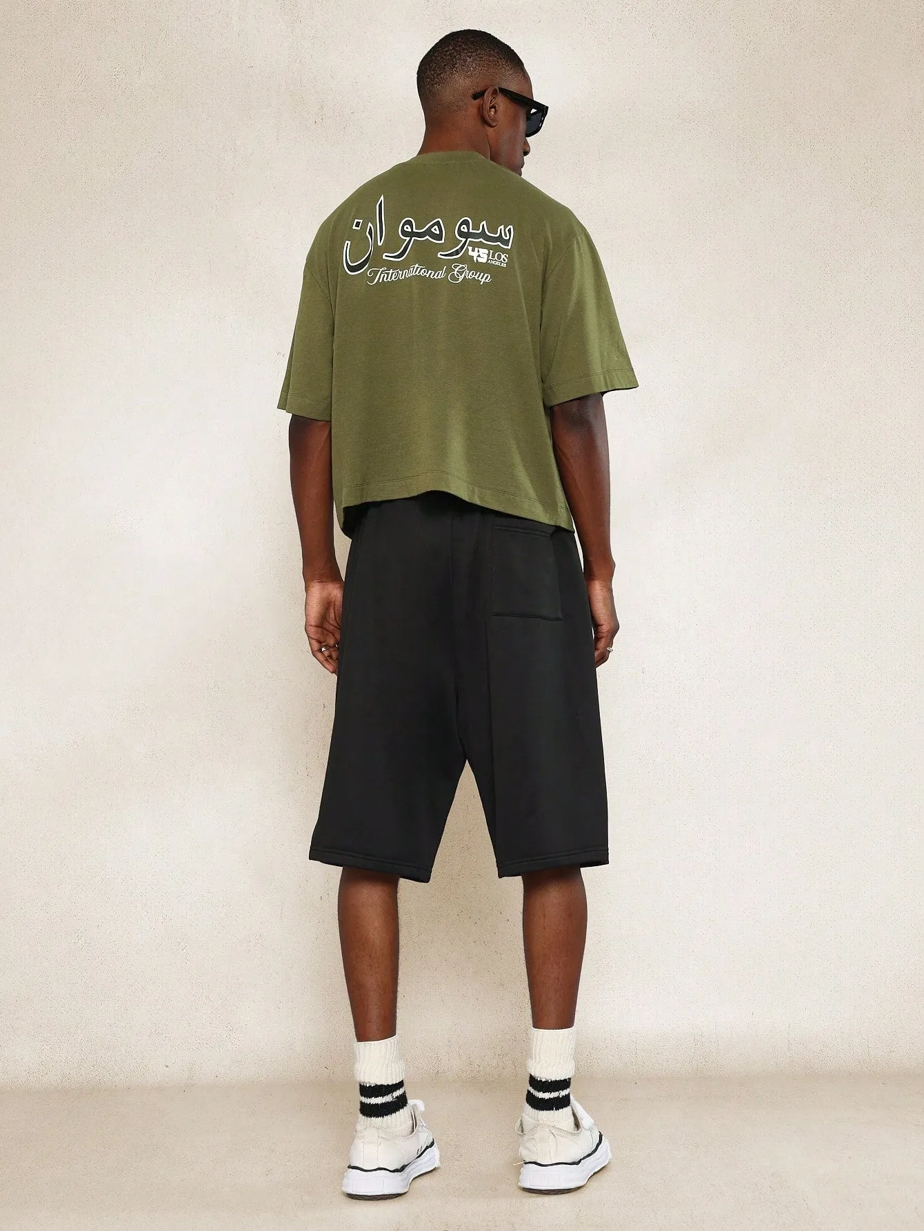 Crop Fit Tee With Arabic Graphic Print  And Pleated Jort 2 Piece Set