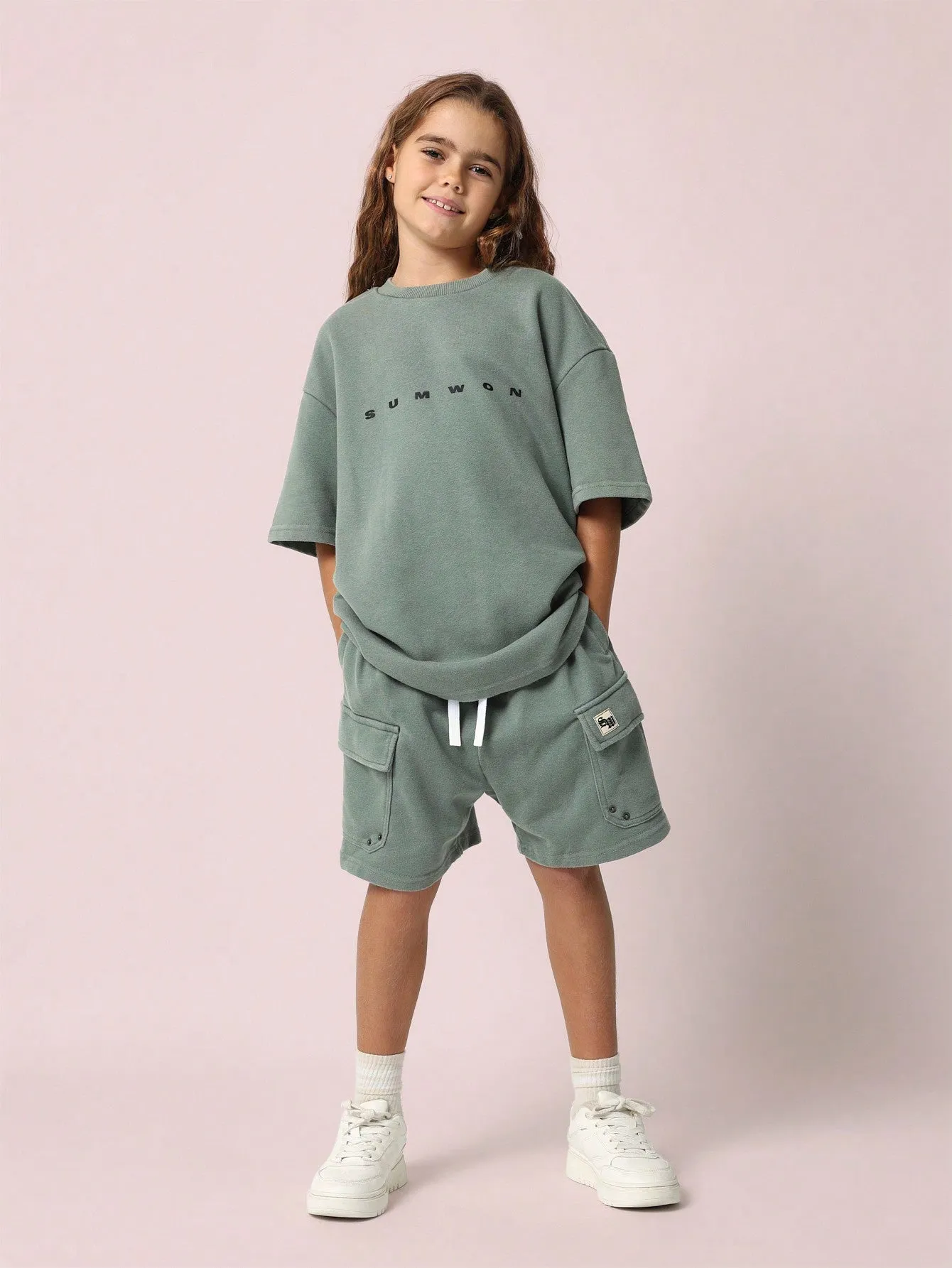 Tween Girls Oversized Graphic Print Tee And Drop Crotch Cargo Short 2 Piece Set