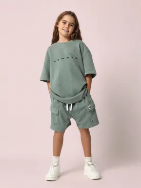 Tween Girls Oversized Graphic Print Tee And Drop Crotch Cargo Short 2 Piece Set